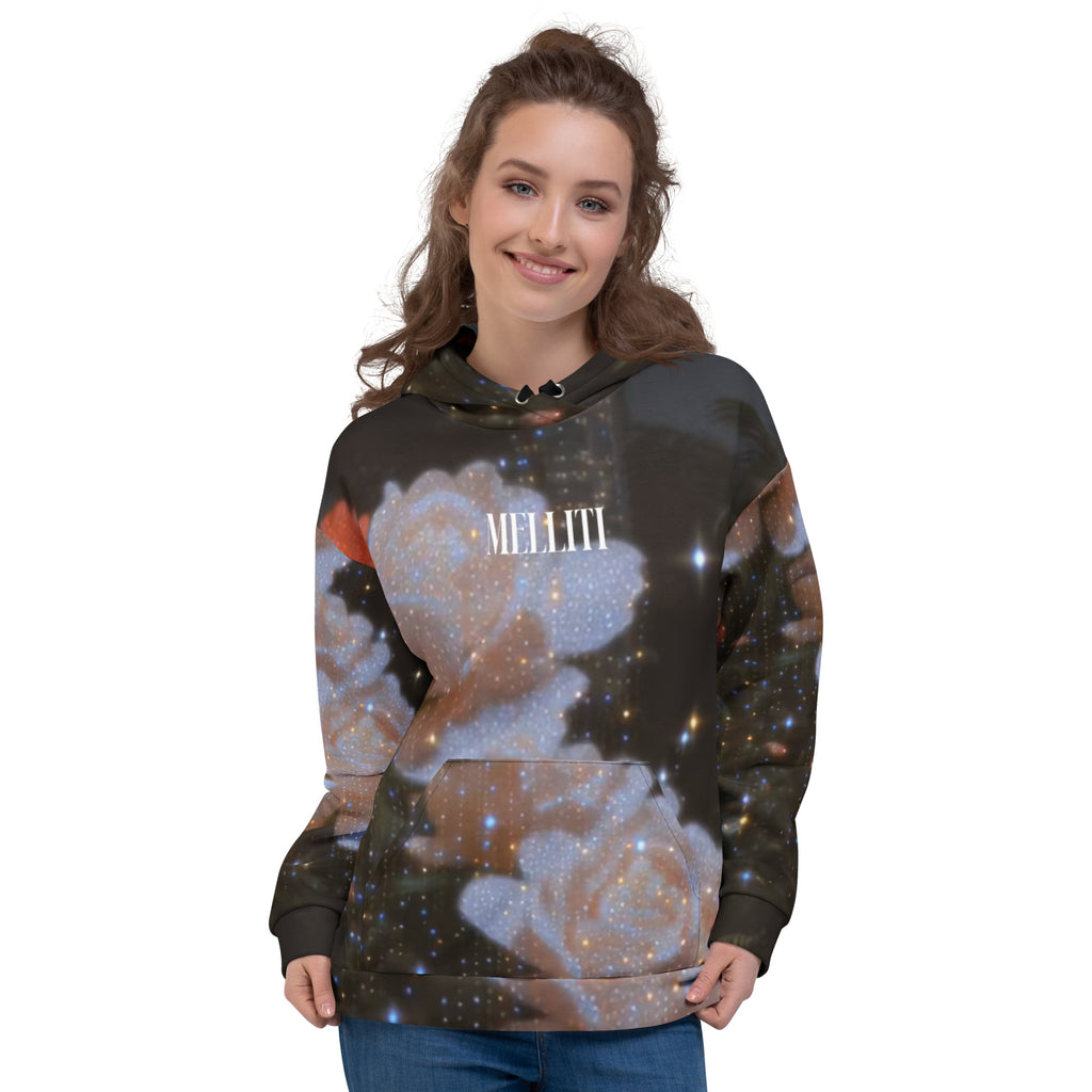 Stylish woman wearing a Unisex Hoodie with floral and starry design, showcasing comfort and modern fit.